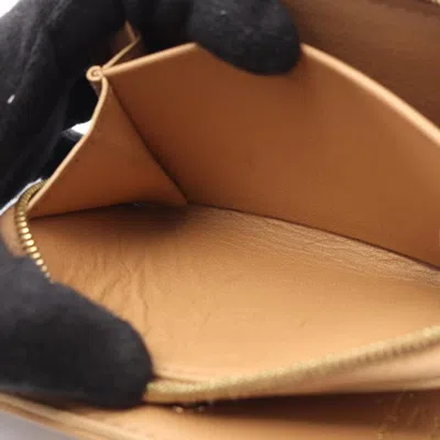 Pre-owned Louis Vuitton Beige Camel Leather Wallet (bi-fold) () In Brown