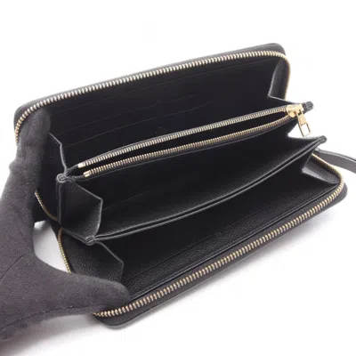Pre-owned Louis Vuitton Black Noir Monogram Empreinte Long Wallet (bi-fold) ()