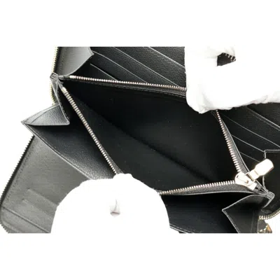 Pre-owned Louis Vuitton Black Noir Taiga Leather Long Wallet (bi-fold) ()