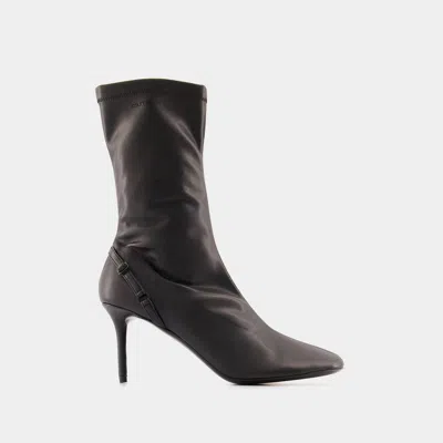 Courrèges Ankle Boots Courreges Pvc Black In Black
