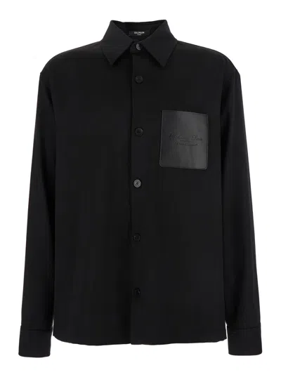 Balmain Men Black Shirt With Classic Collar And Logo Detail On The Pocket In Wool Stretch Man In Black