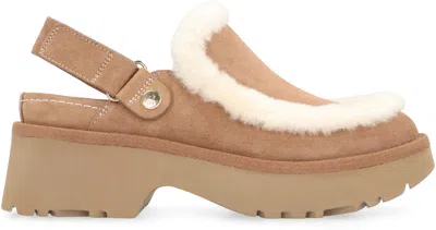 Ugg Suede Mules With Plush Trim And Adjustable Strap In Brown