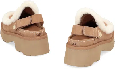 Ugg Suede Mules With Plush Trim And Adjustable Strap In Brown