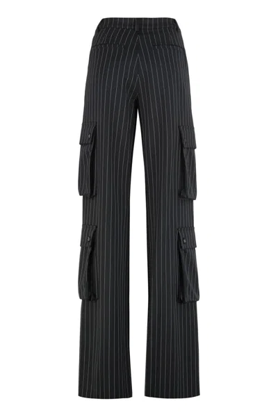 Les Filles D'eva Loose Pants In A Chalk Stripe Pattern In Black