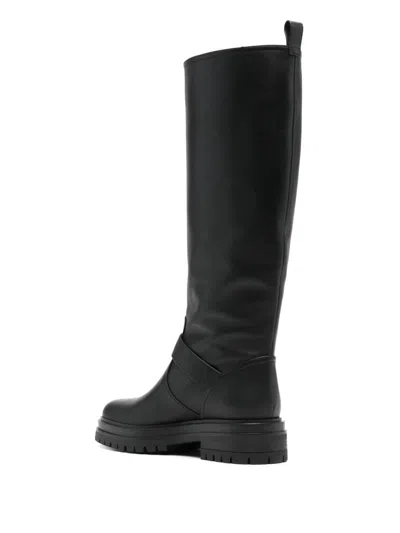 Gianvito Rossi Leather Buckle Lug-sole Moto Boots In Black