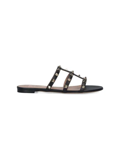 Valentino Rockstud Flat Sandals In Black
