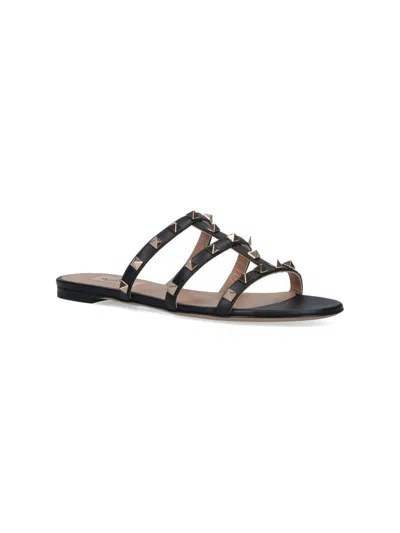 Valentino Rockstud Flat Sandals In Black