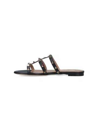 Valentino Rockstud Flat Sandals In Black
