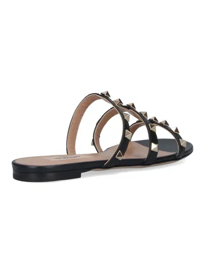 Valentino Rockstud Flat Sandals In Black