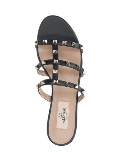 Valentino Rockstud Flat Sandals In Black