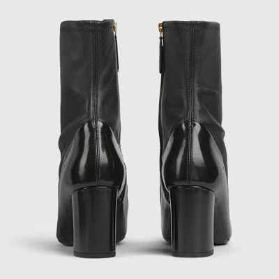 Gucci Heeled Ankle Boots With Horsebit In Black