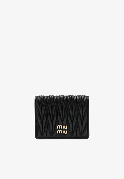 Miu Miu Quilted Leather Wallet With Lettering Logo On The Front In Black