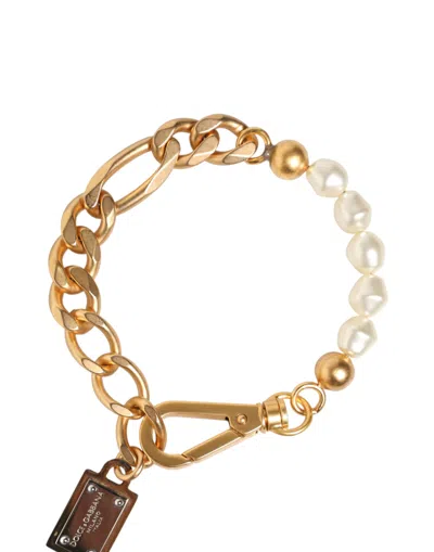 Dolce & Gabbana Gold Tone Brass Faux Pearl Logo Embellish Charm Bracelet In Gold