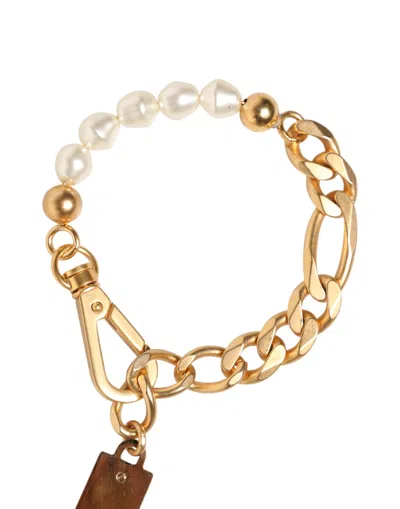 Dolce & Gabbana Gold Tone Brass Faux Pearl Logo Embellish Charm Bracelet In Gold