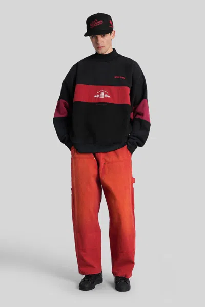 Willy Chavarria Toluca Oversized Wide-leg Distressed Cotton-canvas Trousers In Red