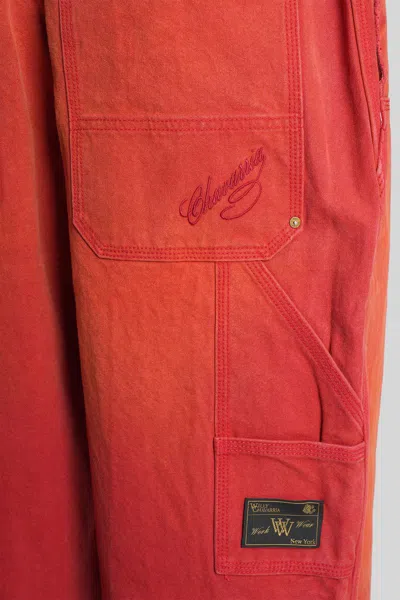 Willy Chavarria Toluca Oversized Wide-leg Distressed Cotton-canvas Trousers In Red