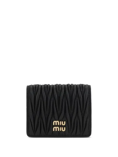 Miu Miu Quilted Leather Wallet With Lettering Logo On The Front In Black
