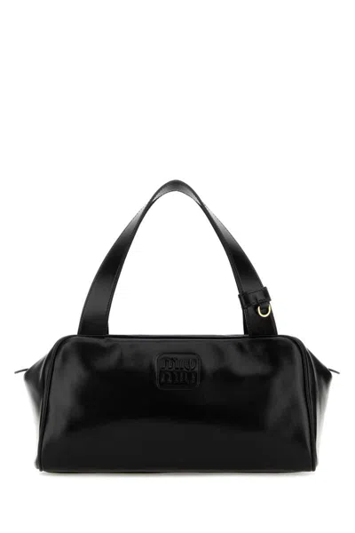 Miu Miu Handbags. In Black