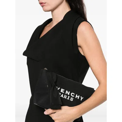 Givenchy Bow-detailed Logo Clutch Bag In Black