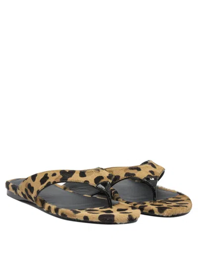 Alaïa Pony Skin Flip Flops In Animal Print