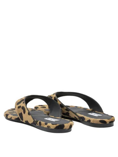 Alaïa Pony Skin Flip Flops In Animal Print