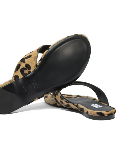 Alaïa Pony Skin Flip Flops In Animal Print