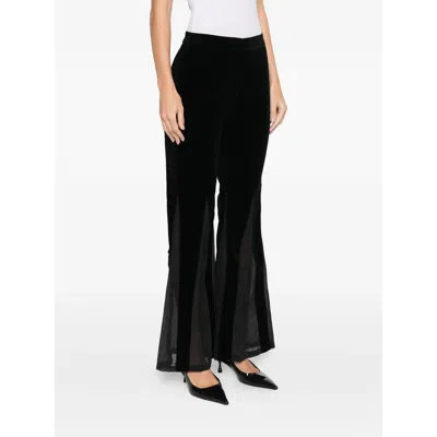 Never Fully Dressed Velvet Flared Trousers In Black