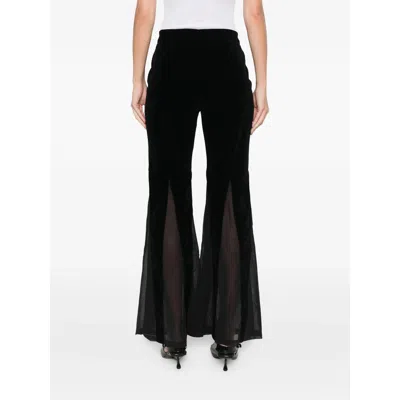 Never Fully Dressed Velvet Flared Trousers In Black