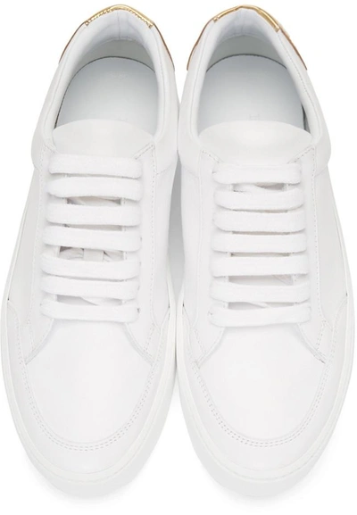 Shop Burberry White Leather Salmond Sneakers In White/gold