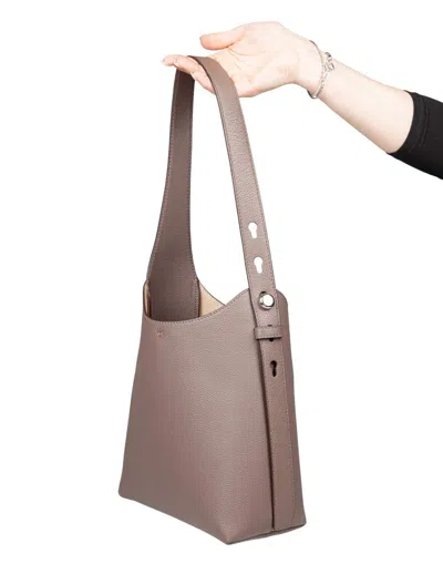 Tory Burch The Romy Small Hobo Bag Is Made Of Soft Hammered Leather In Brown