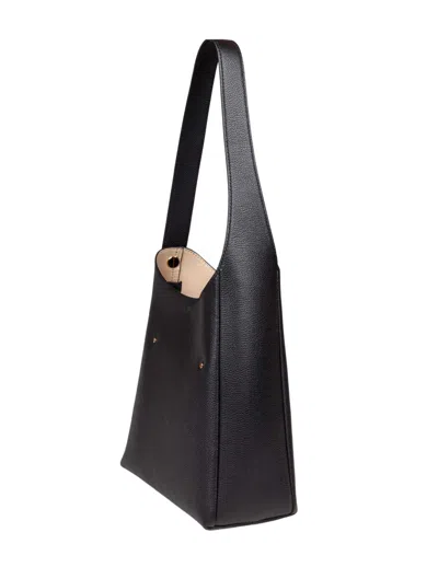 Tory Burch The Romy Small Hobo Bag Is Made Of Soft Hammered Leather In Black