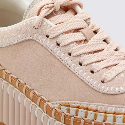 Chloé Low Top Sneakers Featuring Contrast Stitching And Textured Sole In Neutral