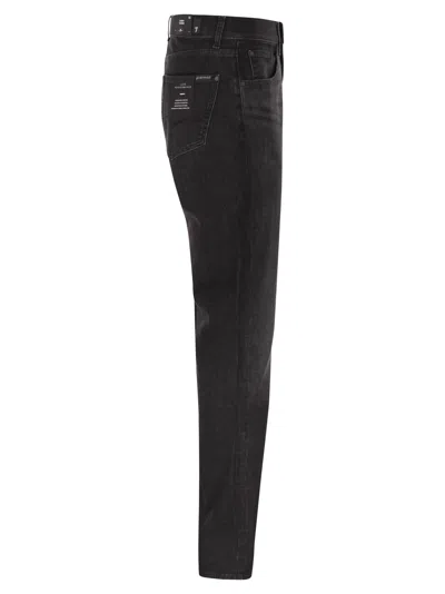 7 For All Mankind Slimmy Tapered Skinny Medium Waisted Jeans In Black