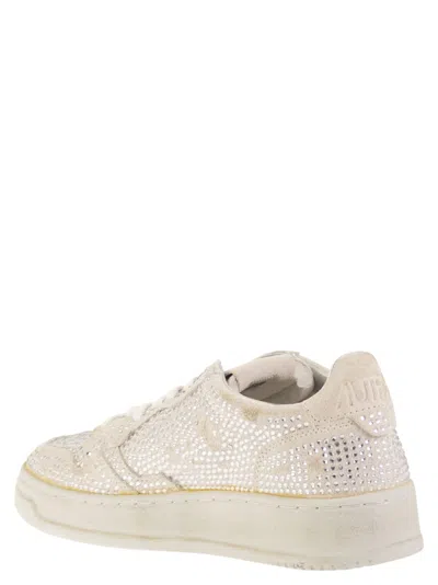 Autry Medalist Low Sneakers In Worn-out Effect Suede With Rhinestones In Neutral