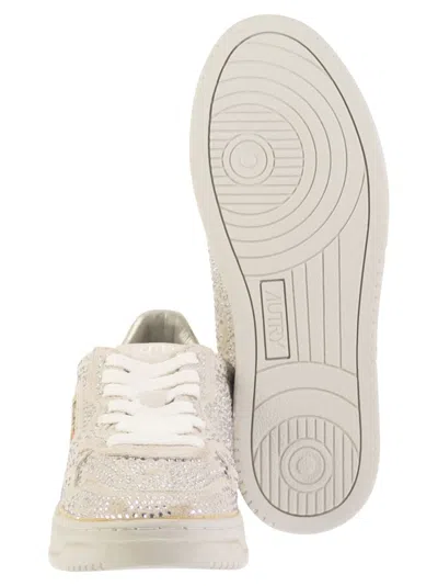 Autry Medalist Low Sneakers In Worn-out Effect Suede With Rhinestones In Neutral