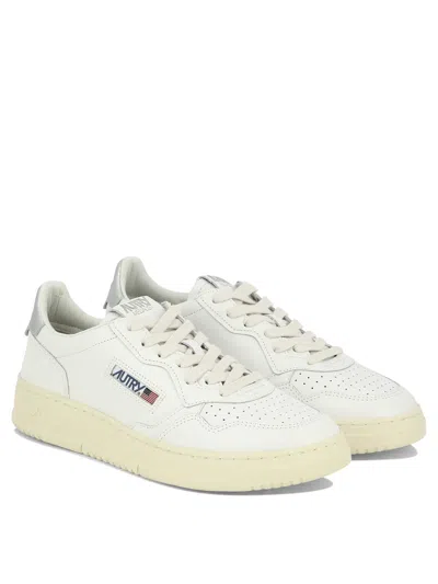Autry Low-top Sneakers With Contrast Sole And Perforated Detailing In White