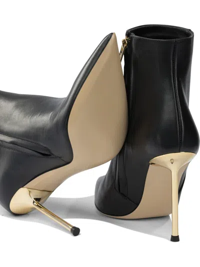 Ninalilou Pointed-toe Ankle Boots In Black