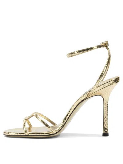 Jimmy Choo 1998 Leo 100 Metallic Leather Sandals In Gold