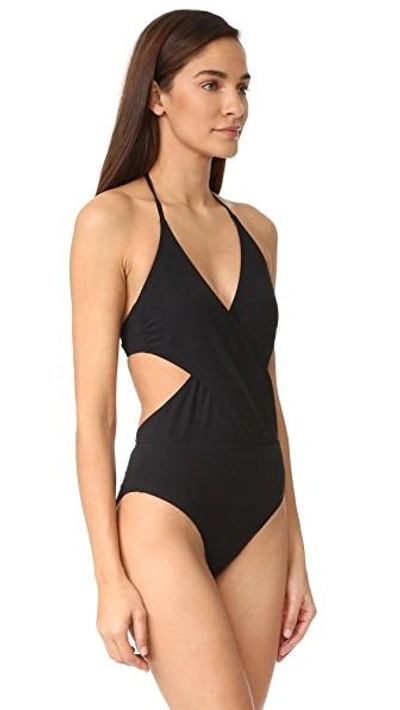 Shop Tory Burch Solid Wrap One Piece In Black