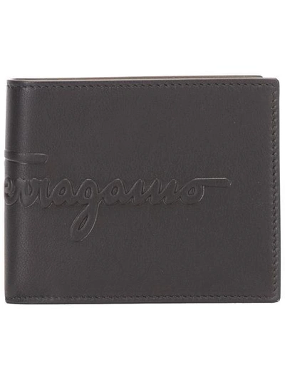 Shop Ferragamo Salvatore  Embossed Logo Wallet - Black