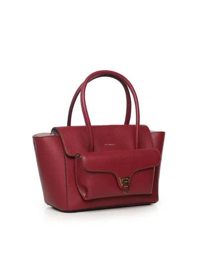 Coccinelle Double Beat Medium Leather Bag In Burgundy