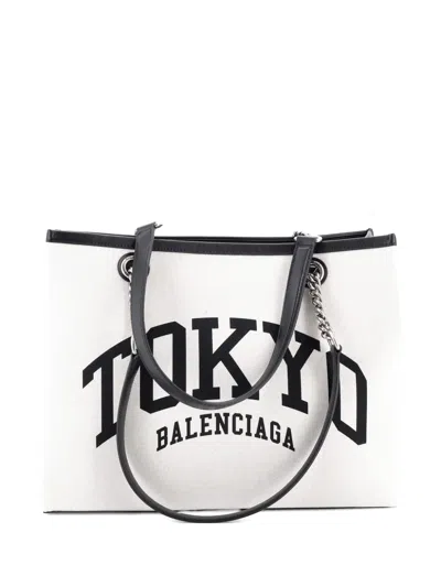 Pre-owned Balenciaga Cities Duty Free Printed Canvas Medium Tote Bag In Neutral