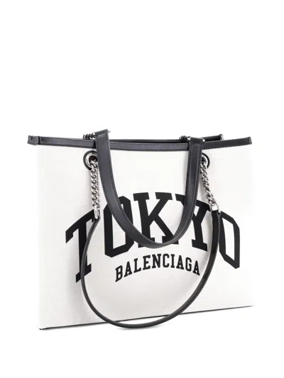 Pre-owned Balenciaga Cities Duty Free Printed Canvas Medium Tote Bag In Neutral