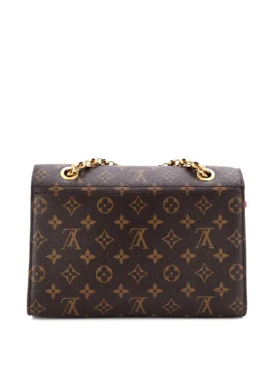 Pre-owned Louis Vuitton Victoire Handbag Monogram Canvas And Leather Shoulder Bag In Brown
