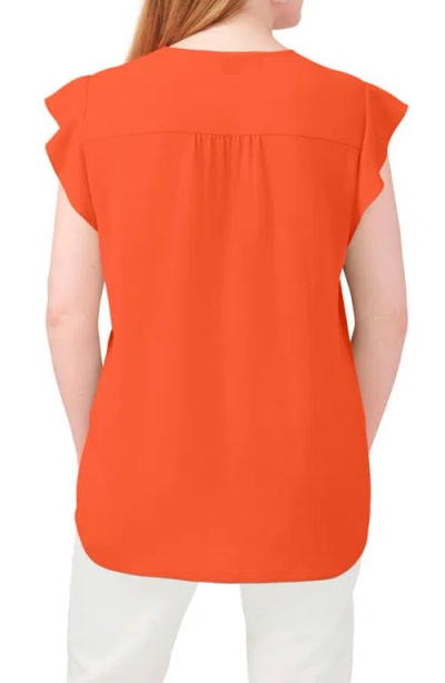 Chaus Print Flutter Sleeve Blouse In Orange