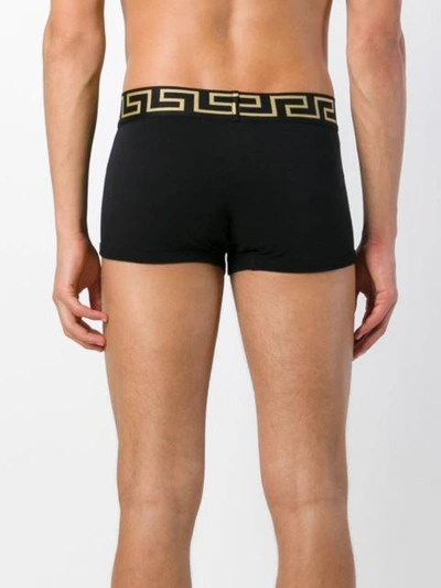 Shop Versace 'greca' Fitted Boxer Shorts In Black