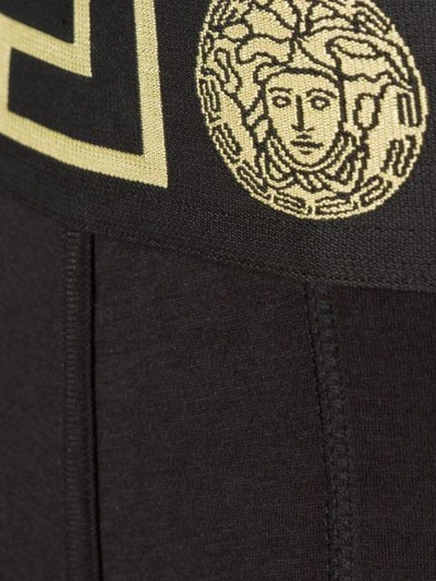 Shop Versace 'greca' Fitted Boxer Shorts In Black