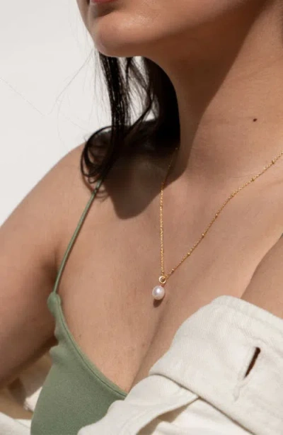 Dower & Hall Timeless Adjustable 8mm Oval White Pearl Pendant In Gold