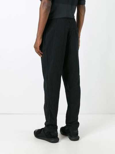 Shop Lost & Found Ria Dunn Folded Front Pinstripe Trousers - Black