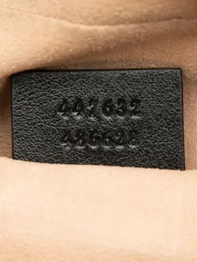 Pre-owned Gucci 2016-2025 Small Gg Marmont Matelasse Gg Canvas And Leather Crossbody Bag In Brown